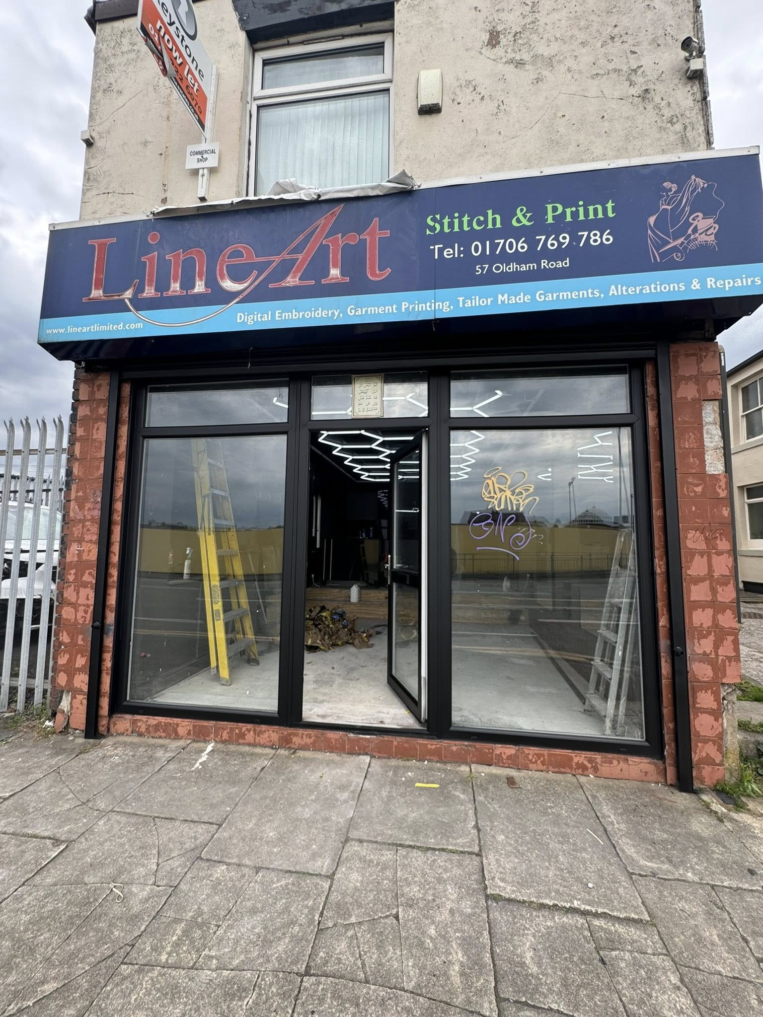Commercial spray finishing on shop front